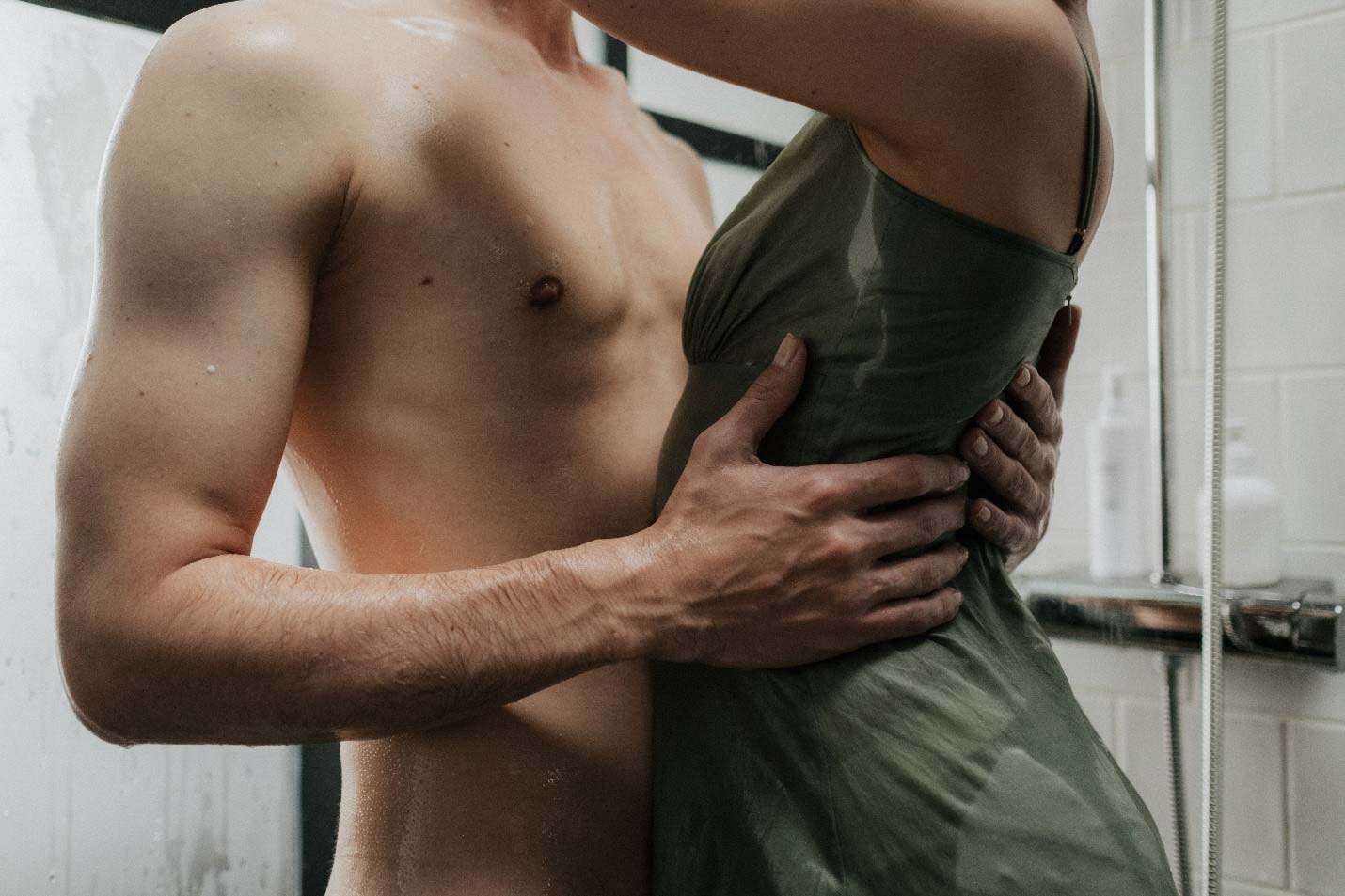 A couple enjoying a romantic shower