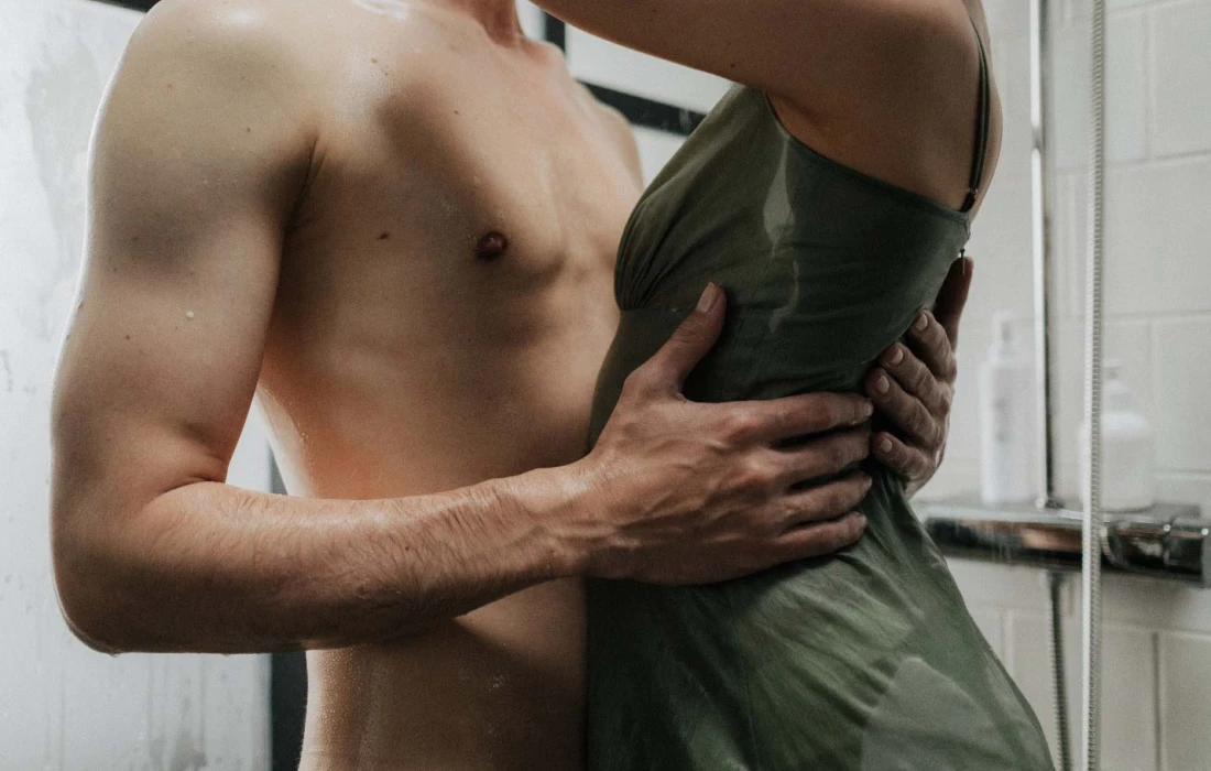 A couple enjoying a romantic shower 
